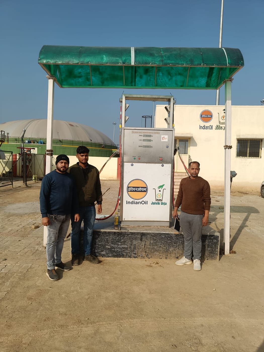 Site team at the commissioned dispenser
